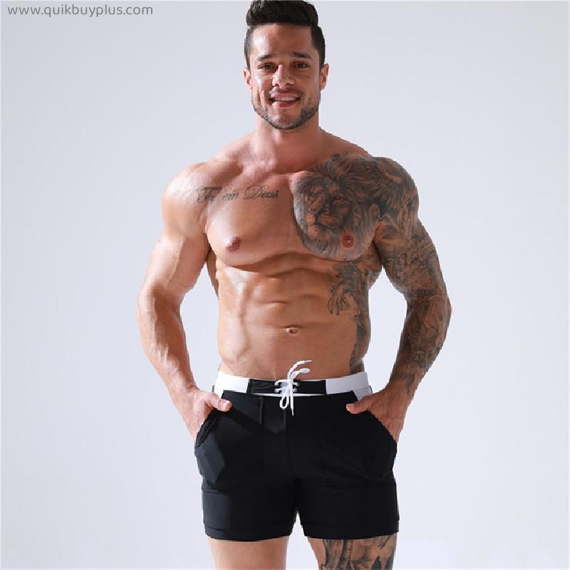 Men's Pocket Swimming Trunks With Inner Lining Tether Boxer European American Beach Shorts Solid Color Stitching Surfing Sports