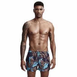 Quick-drying Loose Beach Pants Men's Tide Brand Thailand Seaside Holiday Couple Wear Three-point Swim Trunks Fashion Shorts